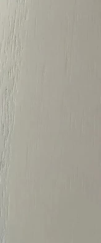 Open stain finish, close-up: a light grey stain with the timber grain showing through